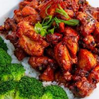 Kang Fu Chicken. · Sweet chili garlic soy sauce, scallions