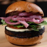 Meatless Burger · 6oz Beyond meat Plant base Proteins, Soy & Black beans, Rice, Onion, Garlic Topped with Pick...