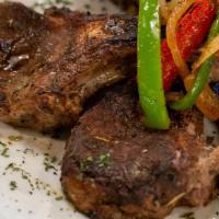 Grilled Lamb Chops · Prepared with Sautéed onions & green peppers.