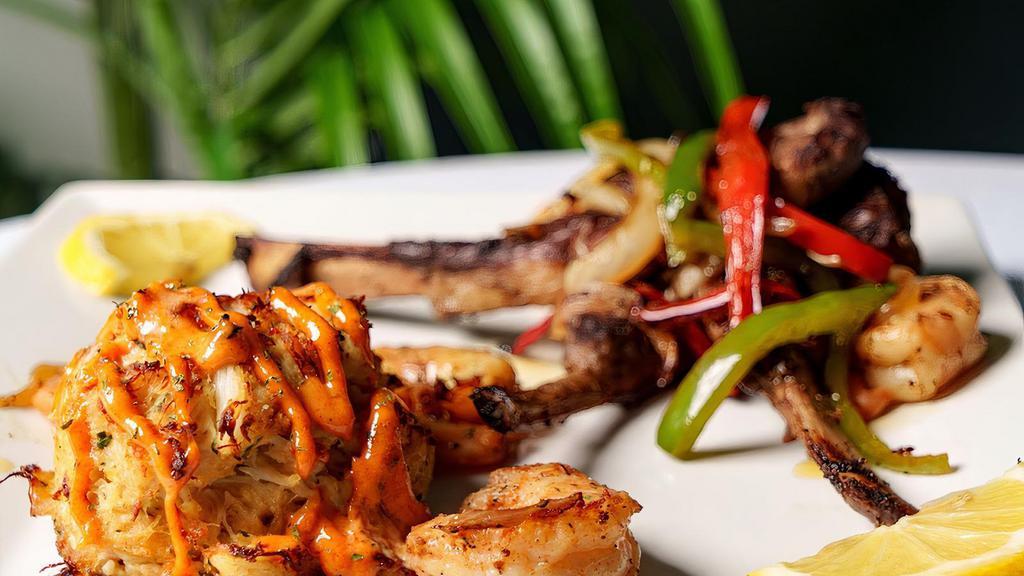 Seafood Trio · Number 1 Seller 3 Grilled Lamb Chops : 6 ounce Lump Crab Cake & 5 Grilled Shrimp with Sautéed Onions
