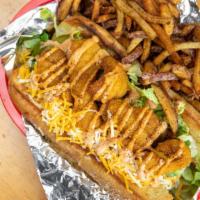 Catfish Po'Boy · Popular. fried catfish, cajun mayo, lettuce, tomato, shredded cheese and pickles on buttered...