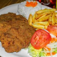 Chuleta Caleña · Breaded fried pork with rice, salad and sweet plantain.