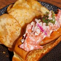 Southern Lobster Roll · Fresh main lobster meat, signature spiced aioli, toasted new england roll served with signat...