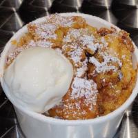 Bread Pudding · Fresh baked bread pudding, chocolate chips, cinnamon, white chocolate, caramel sauce, powder...