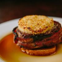 Horseradish-Crusted Filet · House specialty, wrapped in applewood smoked bacon.