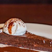 Flourless Chocolate Cake · Hot fudge, whipped cream