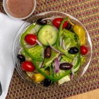 Garden Salad · Mixed lettuce green pepper tomato wedges red onion cucumbers kalamata olives and banana pepp...