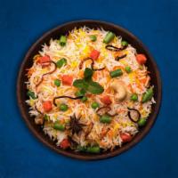 Veggie Biryani(Vegan) · Basmati rice cooked with fresh mixed vegetables cumin seeds, curry leaves, mustard seeds, an...