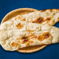Delight Naan Knight(Vegan) · Leavened white bread baked in tandoor oven.