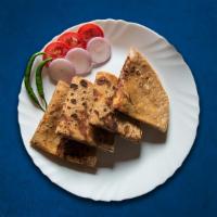 Alu Paratha(Vegan) · Wheat bread stuffed with potatoes mixed with Indian spices.