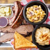 Two Meat Plate · A HALF POUND EACH OF ANY TWO OF OUR SMOKED MEATS WITH YOUR CHOICE OF TWO SIDES.  SERVED WITH...