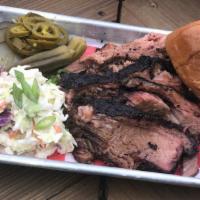 One Meat Plate · A HALF POUND OF ANY OF OUR SMOKED MEATS WITH YOUR CHOICE OF TWO SIDES.  SERVED WITH PICKLES,...