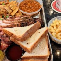Cowboy Platter · (REQUIRES 24HR NOTICE)

NEED TO FEED THE WHOLE TABLE? A HALF POUND EACH OF BRISKET, TURKEY, ...