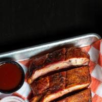 Rib Plate · 1/3 RACK OF OUR TENDER BABY BACK RIBS WITH YOUR CHOICE OF ONE SIDE. SERVED WITH PICKLES, ONI...