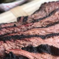 Brisket · OUR TENDER BRISKET TRIMMED & SEASONED WITH OUR HOUSE BRISKET RUB, THEN SMOKED ON AMERICAN WH...