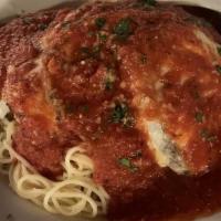 Eggplant Parmesan · Served with angel hair pasta.