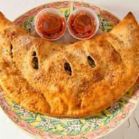 Veggie Stromboli/Calzone · Onions, mushrooms, green peppers, black olives, tomatoes, cheese and pizza sauce.