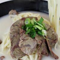 Beef Noodles · Tender beef round steak & noodles in housemade ox bone broth