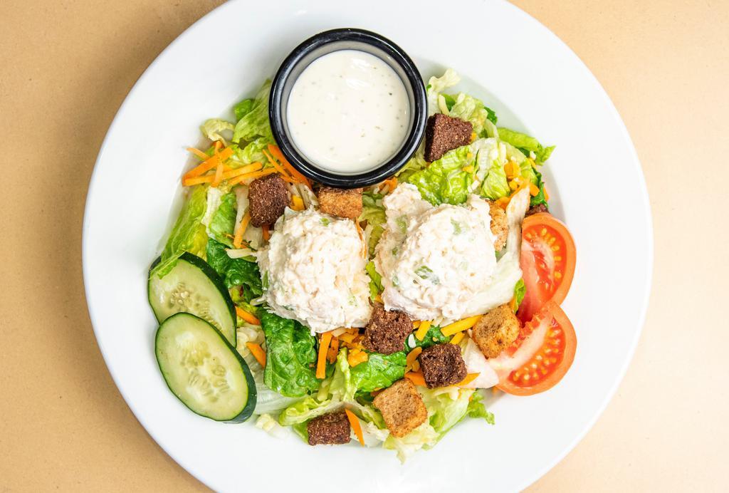Grilled Chicken Salad · A fresh mix of lettuce, tomato, two-cheese blend, cucumbers, carrots and crunchy croutons topped with grilled chicken served with your choice of dressing.