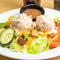Tuna Garden Salad · A fresh mix of lettuce, tomato, two-cheese blend cucumbers, carrots and crunchy croutons top...