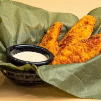 Chicken Tender Basket · Premium chicken tenders, battered and fried to a delicious golden hue and served with your c...
