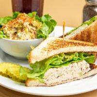 Tuna Salad Club Sandwich · Complete with bacon, lettuce, tomato and mayo. Served on white toast.