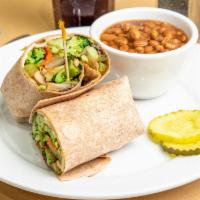 Veggie Wrap · Crisp broccoli, grilled peppers and onions, sautéed mushrooms, and melted cheese fill this d...
