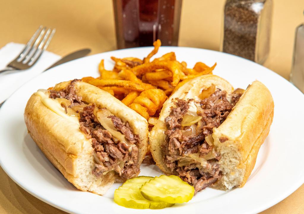 Philly Cheese Steak Loaded Sandwich  · Tender, shaved steak smothered with onions, mushrooms, peppers and melted cheese on a toasted fresh torpedo roll.