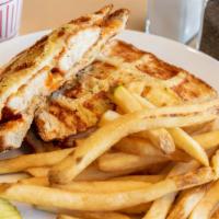 Buffalo Waffled Grilled Cheese  · Crispy, juicy chicken tenders covered with spicy Frank's Red Hot Sauce and topped with melte...