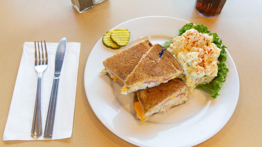 Tuna & Cheddar Mega Melt · Newport Creamery’s own tuna salad, topped with cheddar cheese and tomato on grilled rye bread. Also available Ham & Swiss Mega Melt® or Turkey & Swiss Mega Melt®.