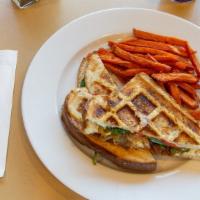 Spinach Pie Waffled Grilled Cheese · A new Newport Creamery favorite...waffled! Sauteed spinach, red and green peppers, grilled o...