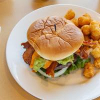 Avacado Bacon Burger · Avacado slices tops this Big Beef burger along with bacon, lettuce, tomato, onions and secre...