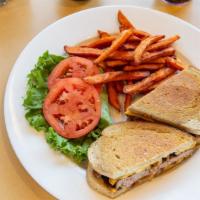 The Burger In The Rye  · A classic patty melt served with melted cheddar cheese on fresh rye bread and topped with sa...