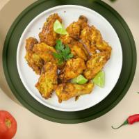 Mustardos Honey Wings · Fresh chicken wings fried and tossed in honey mustard sauce. Served with your choice of dipp...