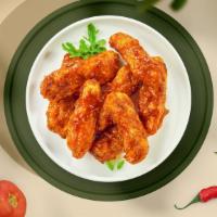 Baby Bbq Tenders · Chicken tenders fried until golden brown before being tossed in barbecue sauce. Served with ...