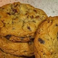 Chocolate Chip With Pecans · The product contains dairy and tree nuts. Ingredients: love, flour, castor sugar, brown suga...