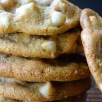 White Chocolate Macadamia Nut Cookies · The product contains dairy and nuts. Ingredients: love, flour, castor sugar, brown sugar, eg...