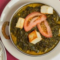 Saag Paneer · Vegetarian. Homemade cheese cubes and chopped spinach cooked in a mild and creamy sauce.