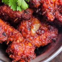 Gobi Manchurian · A very popular indo-Chinese fusion fo batter fried cauliflower cooked with a spicy indo-Chin...