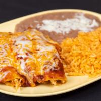Enchiladas Rojas O Verdes · Choice of chicken, ground beef or cheese filling in red or green sauce.