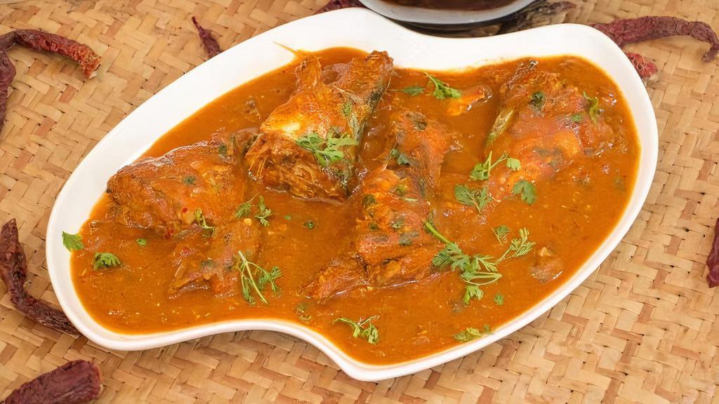 Andhra Fish Curry · Boneless fish cooked in traditional Andhra tangy style with homemade spices.