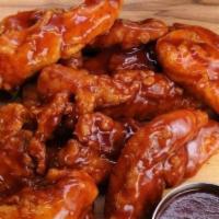 10 Pcs. Boneless Wings (1 Dip) · Fresh white meat chicken covered with your choice of our wing sauce. Served with Bleu cheese...