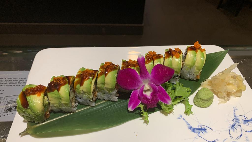 Grasshopper Roll · kani,cucumber and salmon inside,topped w avocado and eel sauce