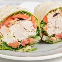 Waldorf Chicken Salad In A Flour Wrap · Chicken salad mixed with cranberries, walnuts and apples topped with lettuce and tomatoes.