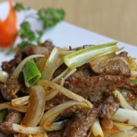 Mongolian Beef · Beef, onion, green onion. (Rice Not Included)