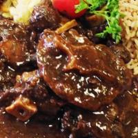 Oxtails · (Only Saturdays) Lg $17.00 8 pcs sold with two sides. Additional sides are four dollars each...