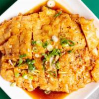 House Special Chicken · Deep-fried chicken marinated in our House special sauce topped with green onion & garlic.