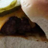Beef Sliders · 3 mini burgers smashed on our griddle with onions, pickles and American cheese. Served on fr...