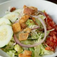 House Salad · Mixed greens with carrots, tomatoes, cucumbers, onions, cheese and croutons. Served with you...