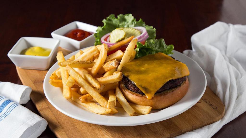 Blue Moose Burger · Black Angus ground beef served on a locally baked Farm to Market bun with crisp lettuce, fresh tomato, pickles, and onion. Choice of provolone, Swiss, cheddar, American, bleu cheese crumbles, traditional pepper jack, or extra spicy ghost pepper jack cheeses.